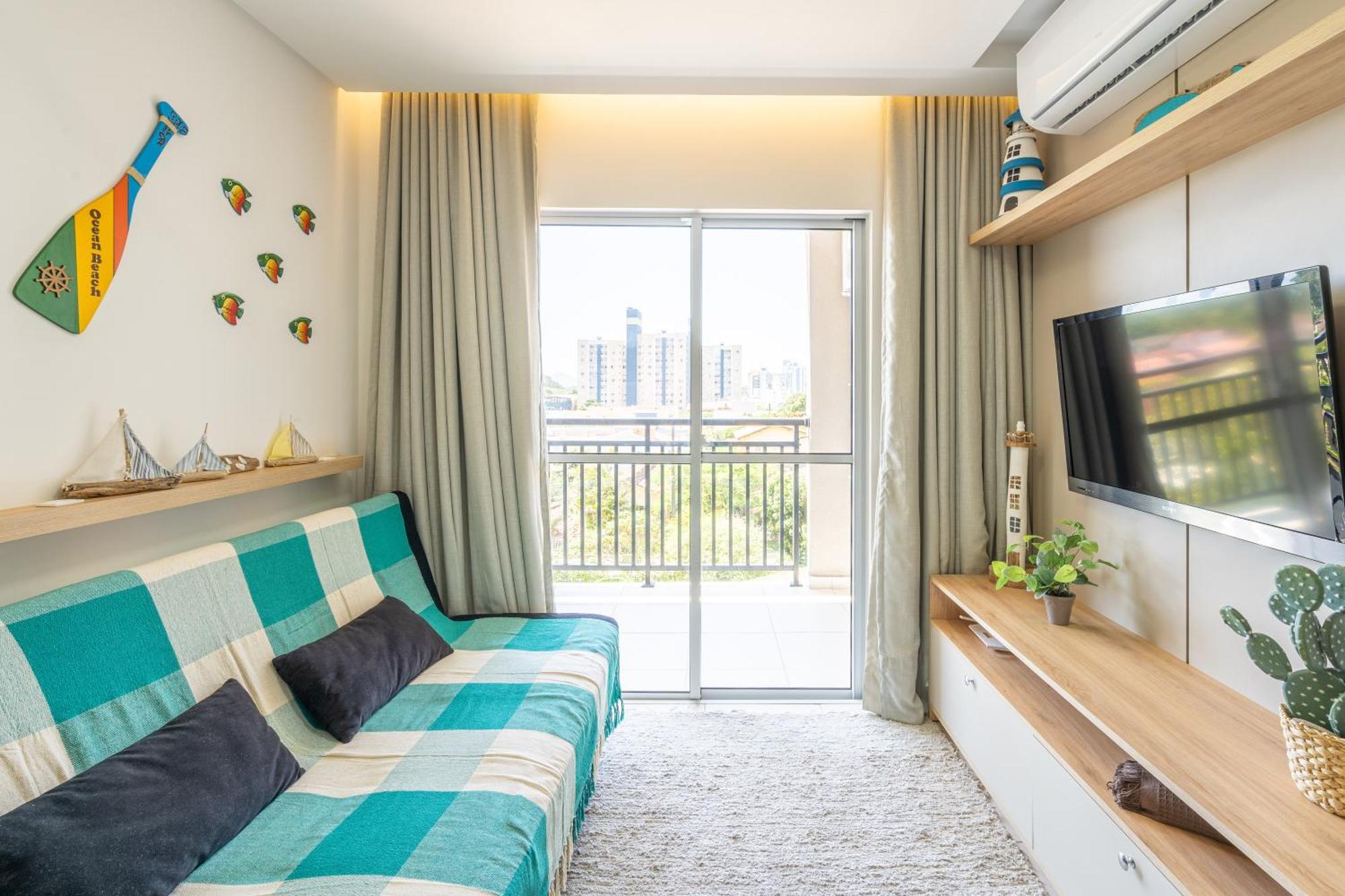 Apartamentos Piçarras: Beachfront Comfort with Pool and 24/7 Security Room photo